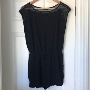Size M black romper by Forever 21